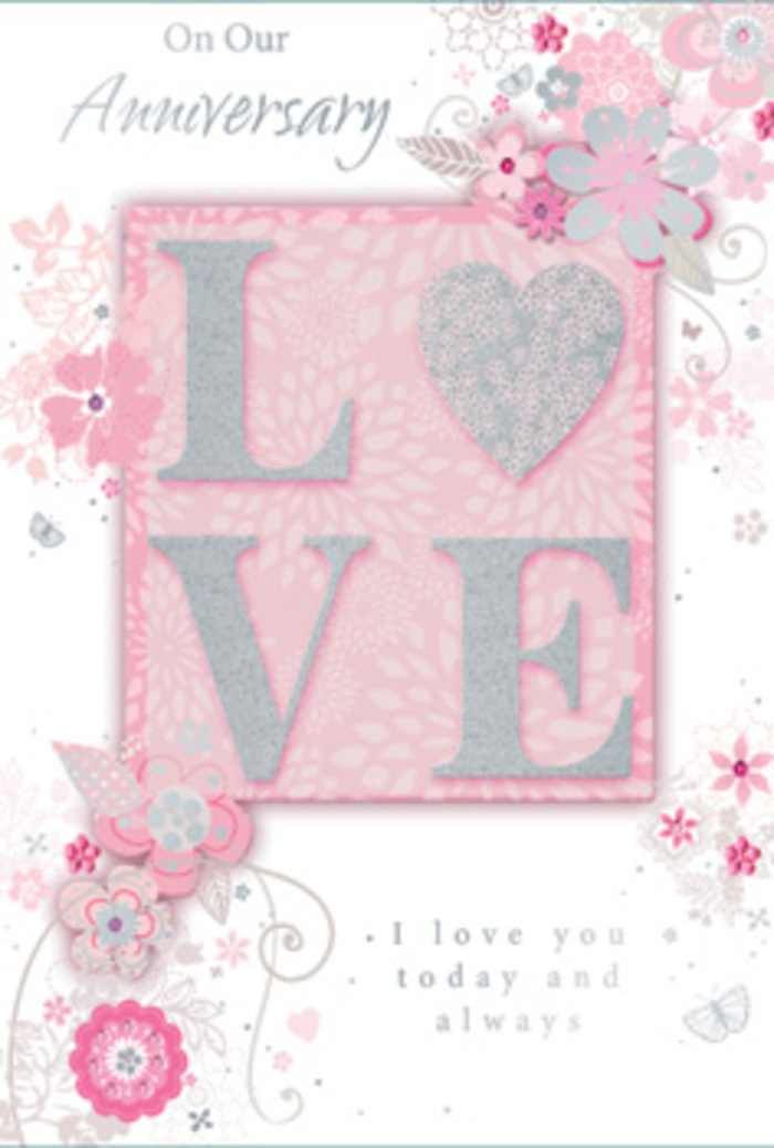 Opening this anniversary card is like stepping into a soft pool of light in a quiet Lower Clapton living room, where love is honoured in small, daily gestures. Dominating the design is the word LOVE, printed in large capitals and finished with a frosted glitter effect that gently shimmers when tilted in the light. The raised letters have a velvety texture beneath the fingertips, recalling the feel of satin ribbon tied around a bouquet. Around this central motif, wispy, hand-drawn floral sprays sweep across the card's surface, drifting along the edges and corners without ever feeling heavy. The blooms are illustrated in shades of blush pink, lilac-tinged mauve, and soft ivory, their petals suggested through fine lines and subtle shading that create depth while maintaining a sense of airiness. Slender leaves, graceful tendrils, and fine filigree curls weave between the flowers, giving the impression of movement, as though the arrangement were gently stirring in a spring breeze coming off Hackney Marshes. Scattered among the flowers, tiny butterflies are almost hidden, their delicate shapes only revealed on closer inspection-small details that reward a lingering gaze. The background remains a soft, warm pink that gradually lightens toward the edges, enhancing the dreamy, romantic mood. Nestled within the design, the phrase I love you today and always is set in understated, graceful type, like a private promise shared quietly between two people. The effect is of a paper bouquet crafted with the same care a local florist in Lower Clapton gives to a hand-tied anniversary arrangement: personal, refined, and full of heartfelt sentiment.