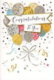The photo presents a tall congratulations card whose artwork radiates the easy, festive charm of a Lower Clapton celebration. At the centre of the card floats a generous cluster of illustrated balloons gathered like a bouquet, overlapping one another in a soft, rounded mass, reminiscent of balloons tied above a party table near Millfields or along Chatsworth Road. The colours are delicate but glamorous: muted golds and silvers, warm champagne tones, cool sky blue and gentle blush pink. Each balloon is shaded to appear subtly glossy and full, with some adorned in tiny star patterns, slim stripes or scattered glitter accents that bring a sense of sparkle and texture, as though real foil or glitter had been applied. From the undersides of the balloons, fine ribbons stream downward in graceful, curling lines of gold and silver, echoing the flowing ribbons we use to finish special arrangements for delivery across Lower Clapton. The background is kept light and understated, dusted with small stars, dots and swirling confetti lines that drift casually around the balloons, capturing the mood of confetti slowly settling after a toast. Across the middle of the design, a softly curved banner stretches from side to side, with a hint of sheen that suggests a satin-like finish. In elegant, flowing lettering on the banner, the phrase Congratulations To You stands out clearly, its style conveying heartfelt pride and warmth. The entire card design feels uplifting and celebratory, ideal as a companion to fresh flowers sent to mark graduations, job successes, or any special achievement within the Lower Clapton community, carrying with it a sense of admiration and shared joy.