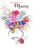 This Mother's Day card shows a joyful, swirling bouquet in watercolour, the kind of expressive floral artwork you might imagine being planned at a florist's bench just off Lower Clapton Road. The flowers are a mix of bold purples, lively pinks, and deep cerise tones, each petal described by fluid indigo lines that give the blooms shape while keeping them soft and dreamy. Calmer notes of powder blue and gentle lavender tuck in among the brighter flowers, creating cool pockets of colour that feel as restful as sitting under the trees in Millfields Park on a mild day. Throughout the design, fine strokes and tiny flecks of gold trace the contours of petals and leaves, catching light in a way that suggests the sparkle of morning sun along the nearby canal. The bouquet rises from an elegant, curving vase painted in delicate washes, its base adorned with a refined golden bow that brings to mind a hand-tied posy just finished and set aside for delivery. Around the arrangement, scattered specks of paint and soft heart shapes float across the stark white background like petals tossed in celebration or confetti drifting on a breeze. The whole composition radiates warmth, joy, and that slightly breathless feeling of wanting to say thank you to Mum in the most beautiful way possible, echoing the creativity and warmth found throughout the streets and homes of Lower Clapton.